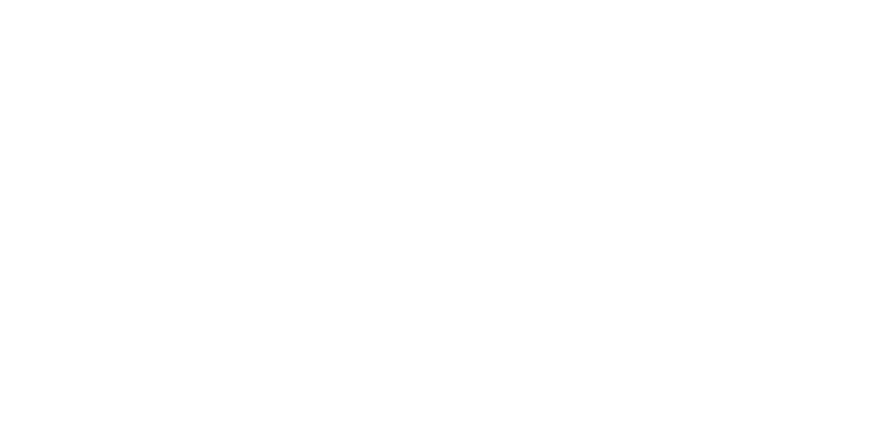 The image displays the word munic in lowercase, white, rounded letters on a light gray background. The text is centered and partially faded, subtly blending into the backdrop—evoking the modern elegance of Vu, lunetterie à Montréal.