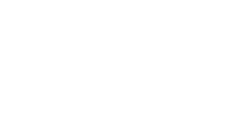 White Nike logo with the word NIKE in bold, uppercase letters above the iconic swoosh symbol, all set against a light gray background. Vu, la lunetterie à Montréal avec le plus grand inventaire de montures, vous propose ce style exclusif.