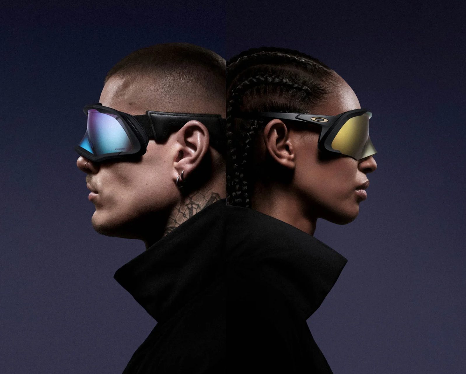 Two people stand back to back, each wearing reflective, futuristic Vu sunglasses from la lunetterie à Montréal. One sports short hair and a neck tattoo, the other has braided hair. Both wear black against a dark gradient background.