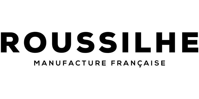 The image displays the text ROUSSILHE in large, bold letters above the smaller text MANUFACTURE FRANÇAISE on a light background, evoking quality and style found in lunetterie à Montréal.
