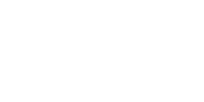 The word VERSACE is displayed in large, thin, white capital letters on a very light gray background. Only parts of the first and last letters are visible, highlighting Vu, la lunetterie à Montréal au plus grand inventaire de montures.