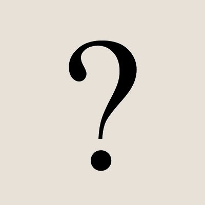 A large, black question mark centered on a light beige background hints at the surprises awaiting at Vu, la lunetterie à Montréal avec le plus grand inventaire de montures.